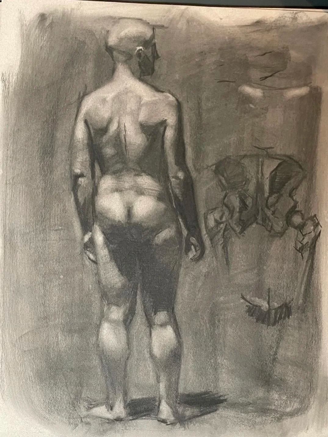 Charcoal study of a standing figure from behind, with smaller anatomical diagrams worked out beside it.
