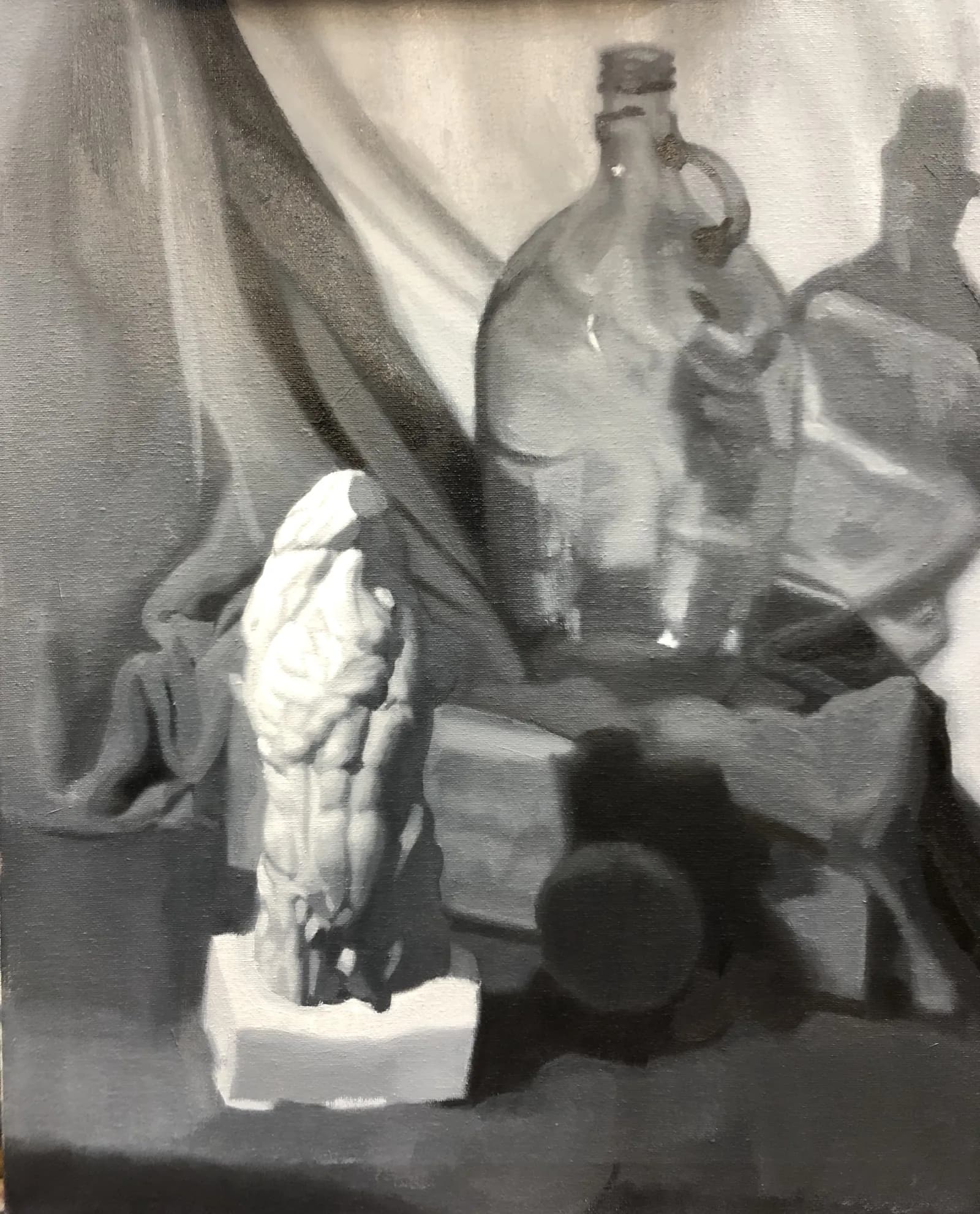 Still life painting: a small plaster figure among glass bottles and folded drapery.